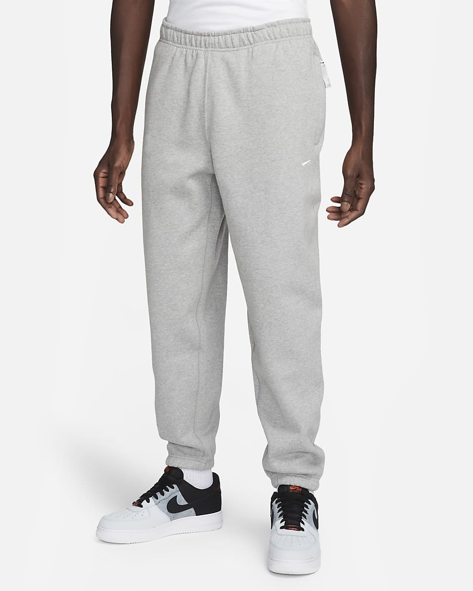 Pantalon en tissu Fleece Nike Solo Swoosh pour Homme. Nike CH